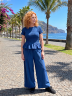 Eirenne | Peplum Detail Smocked Top And Wide Leg Pants Set