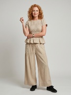 Eirenne | Peplum Detail Smocked Top And Wide Leg Pants Set