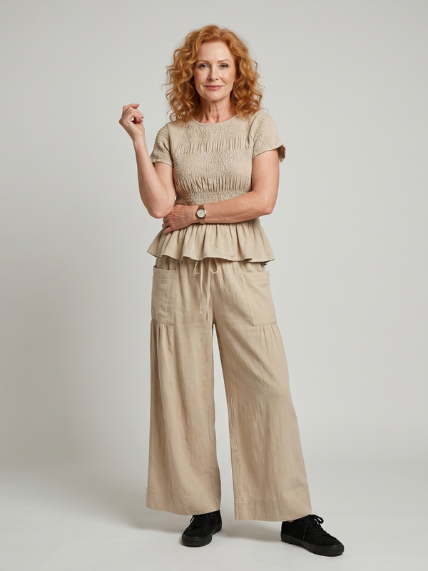 Eirenne | Peplum Detail Smocked Top And Wide Leg Pants Set