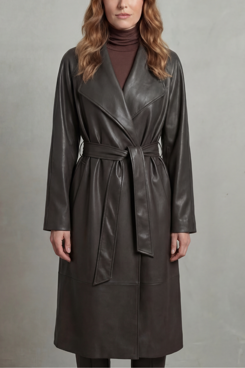 Waist-cinching silhouette | Faux leather trench coat