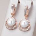 Iconic Rose Gold Pearl Dangle Earrings