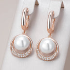 Iconic Rose Gold Pearl Dangle Earrings