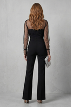 Veloura – Sheer illusion elegance – Flared-leg jumpsuit