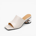 Virelle Curve Leather Mule Heels