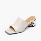Virelle Curve Leather Mule Heels