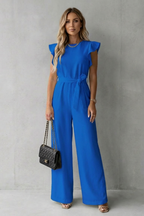 Virelle – Ruffle sleeve belted – Wide-leg jumpsuit